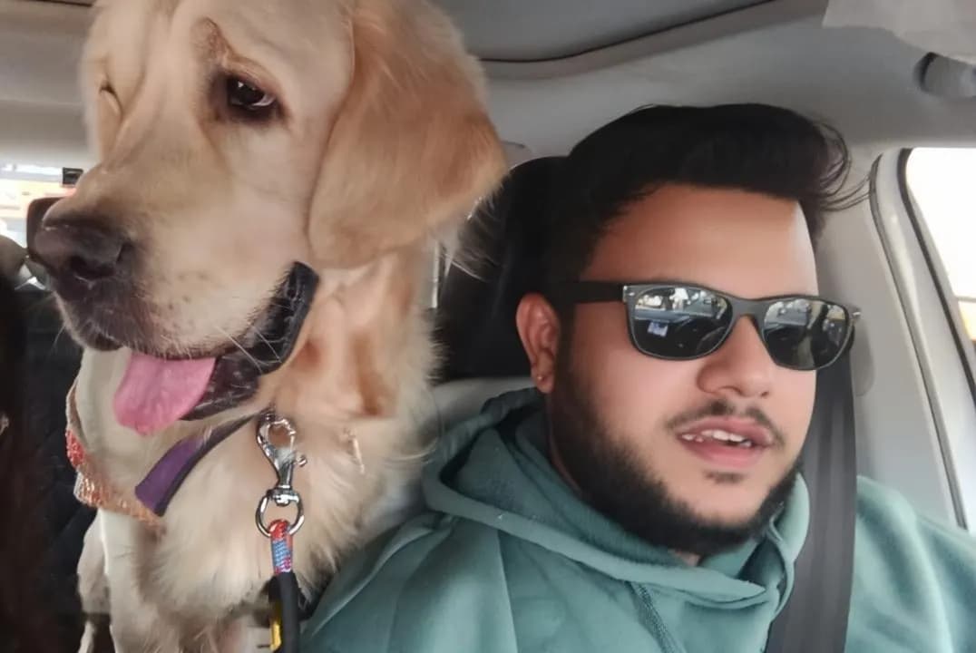 FurDial's founder with Dobby, their golden retriever